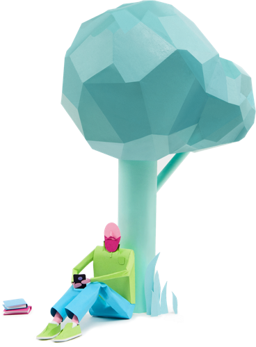 Paper man sitting under tree